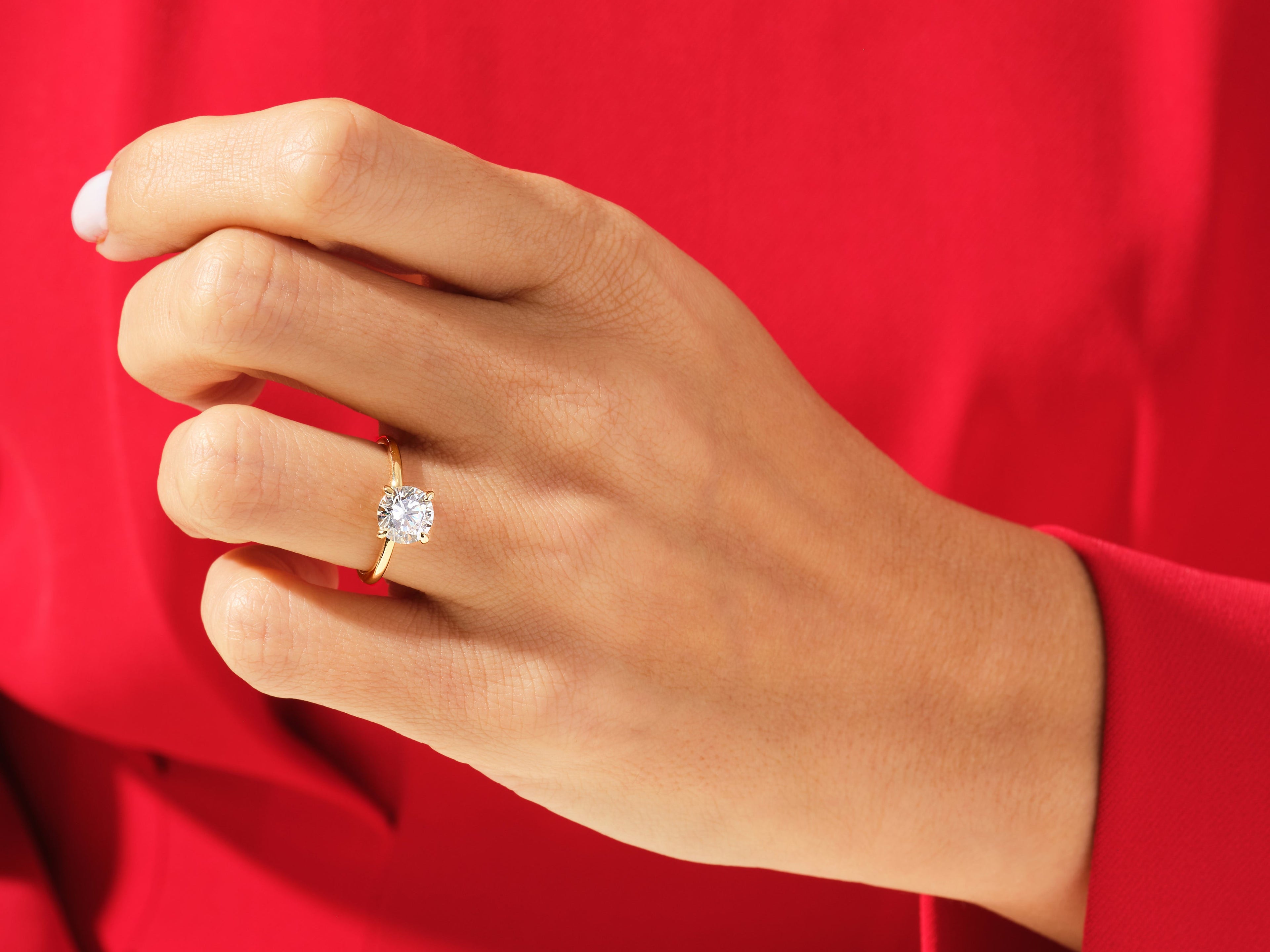 4-Prong Solitaire Round Cut Moissanite Engagement Ring (1.50 CT)