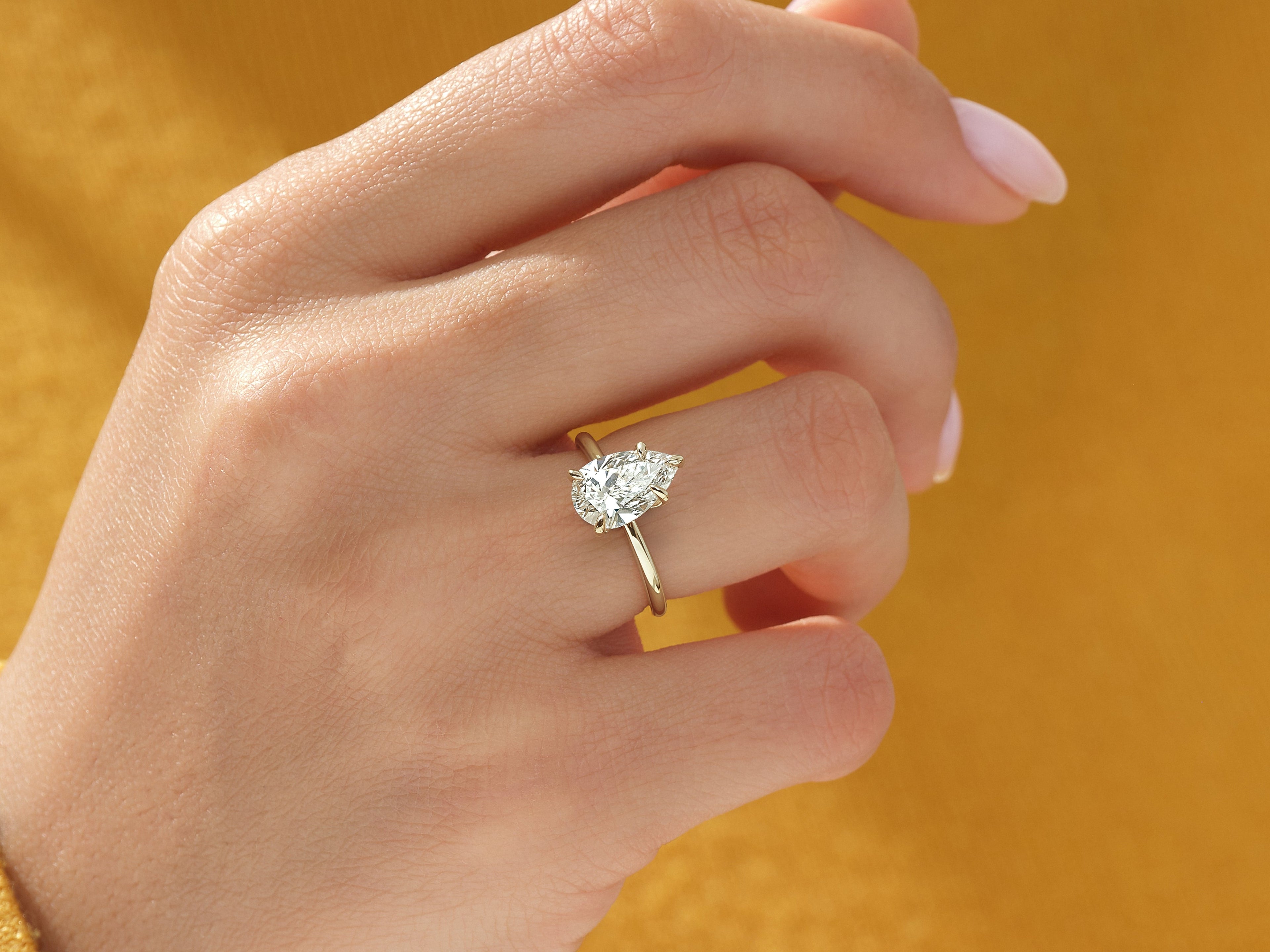 Pear Cut Solitaire Moissanite Engagement Ring (1.50 CT)