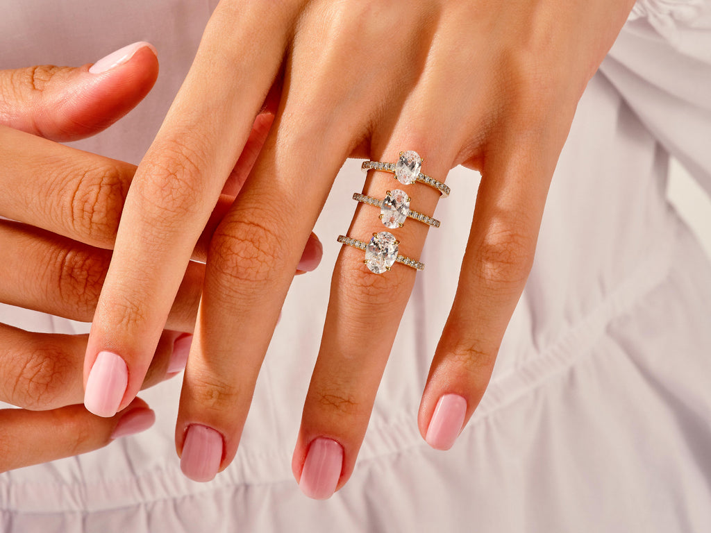 Cathedral Oval Cut Moissanite Engagement Ring with Pave Set Side Stones (1.50 CT)