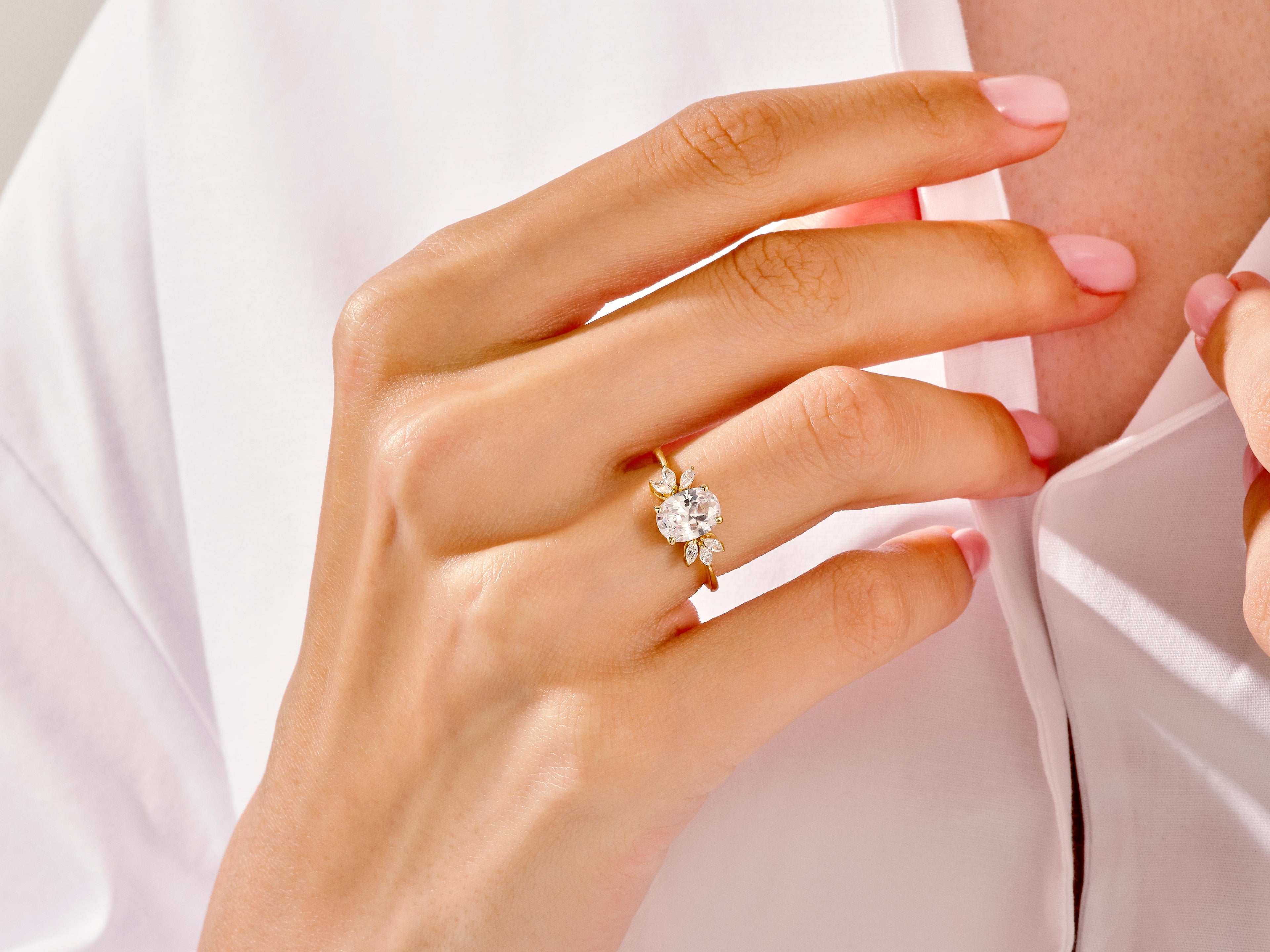 Marquise Cluster Accent Oval Cut Moissanite Engagement Ring (1.50 CT)