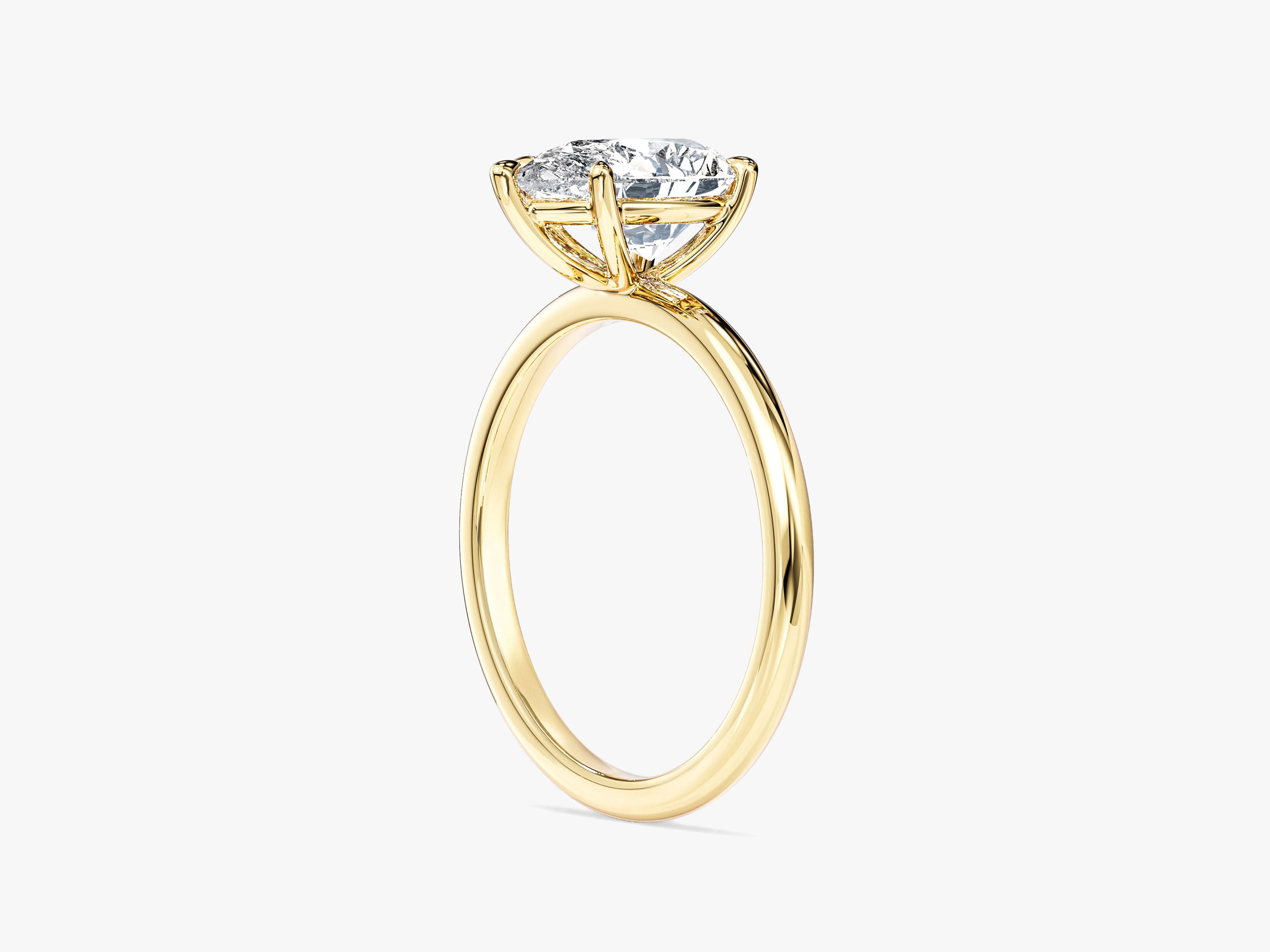 Pear Cut Solitaire Moissanite Engagement Ring (1.50 CT)