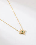 Emerald Starburst Gold Pendant Necklace | Celestial Jewelry