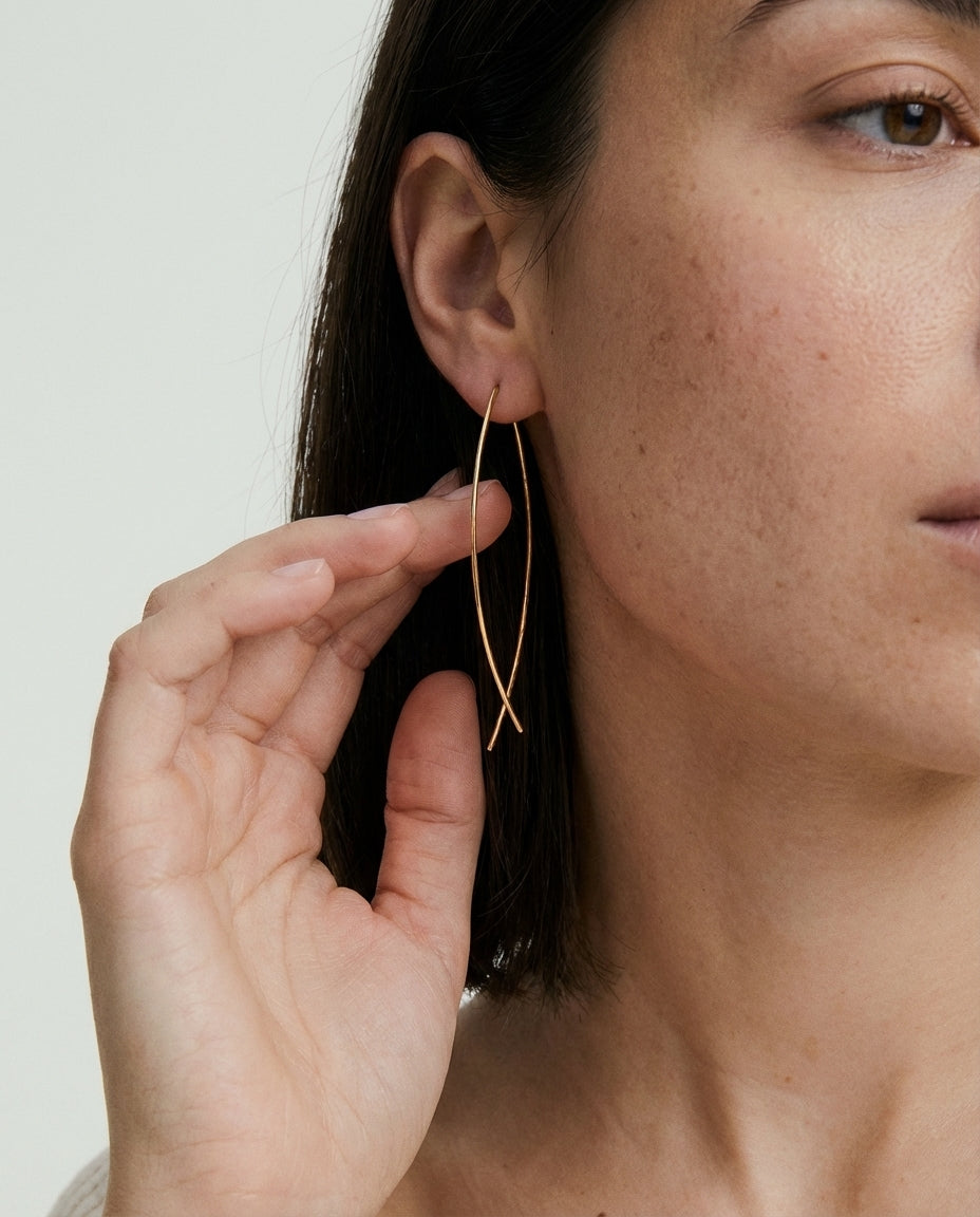 Elegant Gold Criss-Cross Arc Earrings