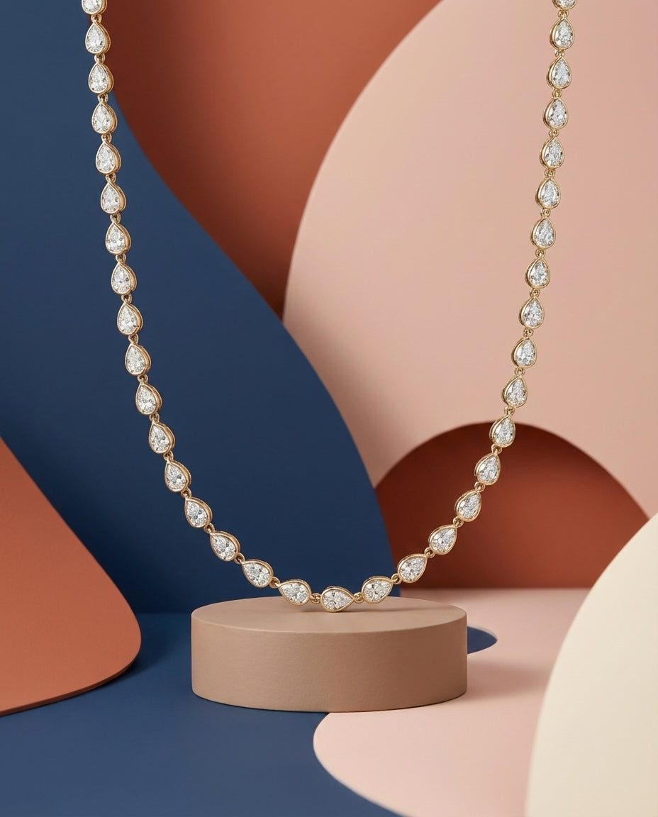 Exquisite Pear Cut Diamond Tennis Necklace in Gold