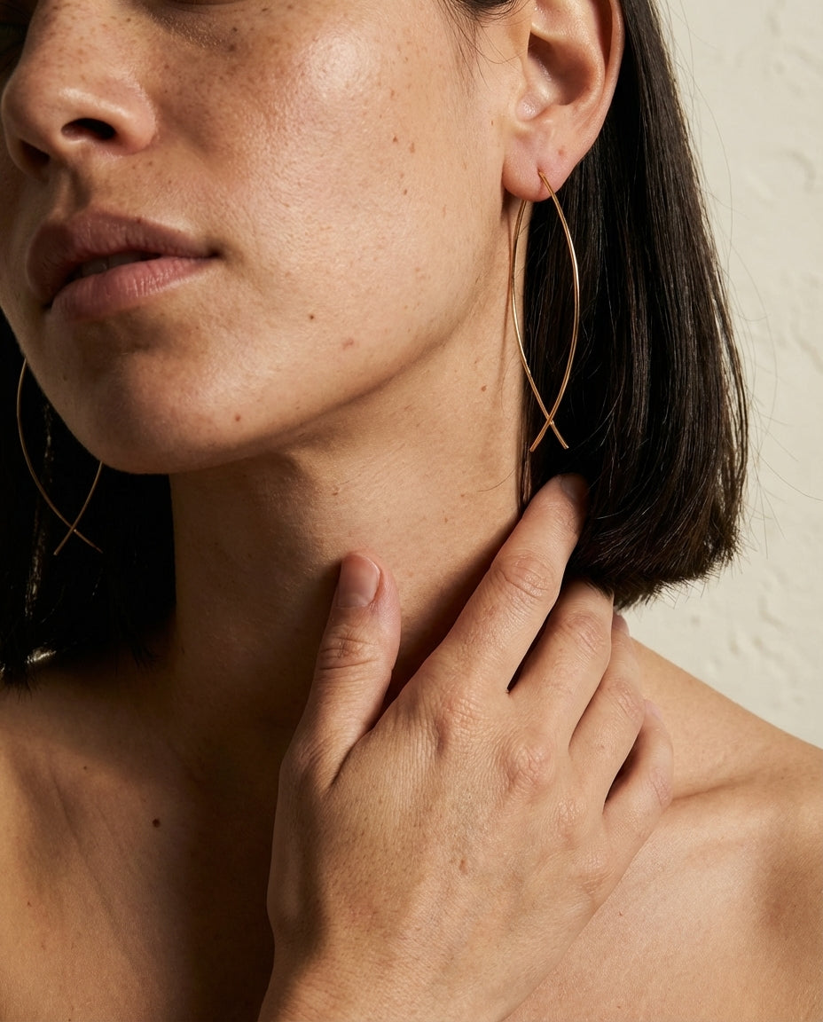 Elegant Gold Criss-Cross Arc Earrings